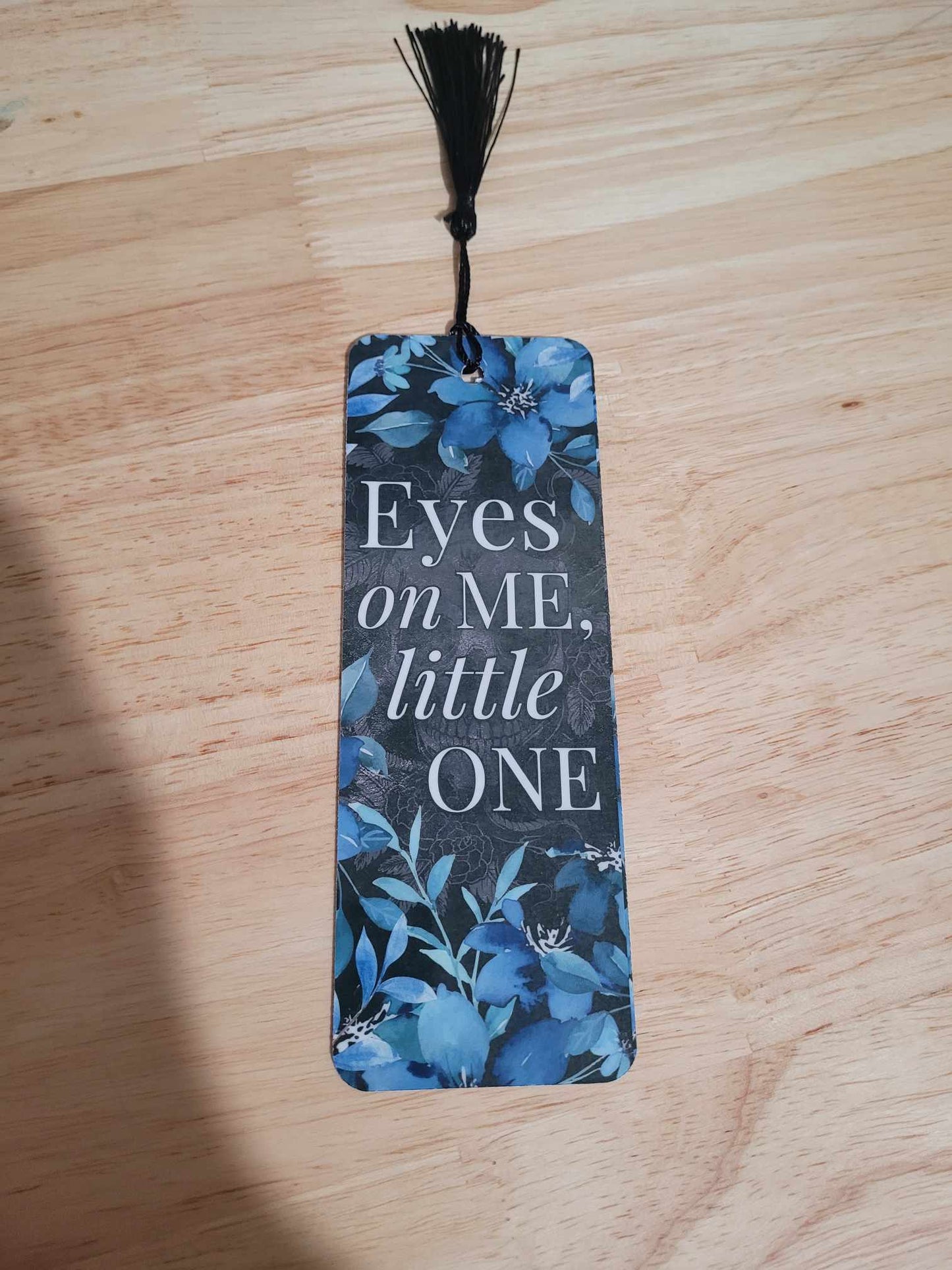 Eyes on me little one 6 inch laminated bookmark with black tassel