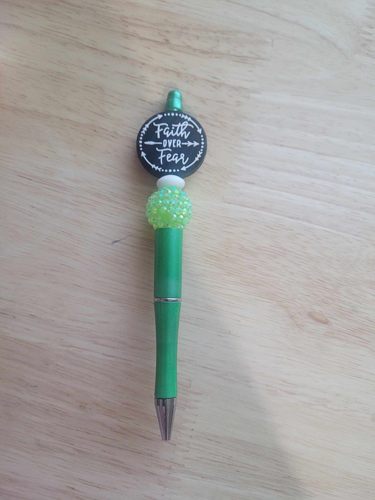 Faith over fear green pen